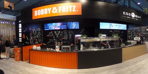 Exhibition Hall with Booths and Visitors